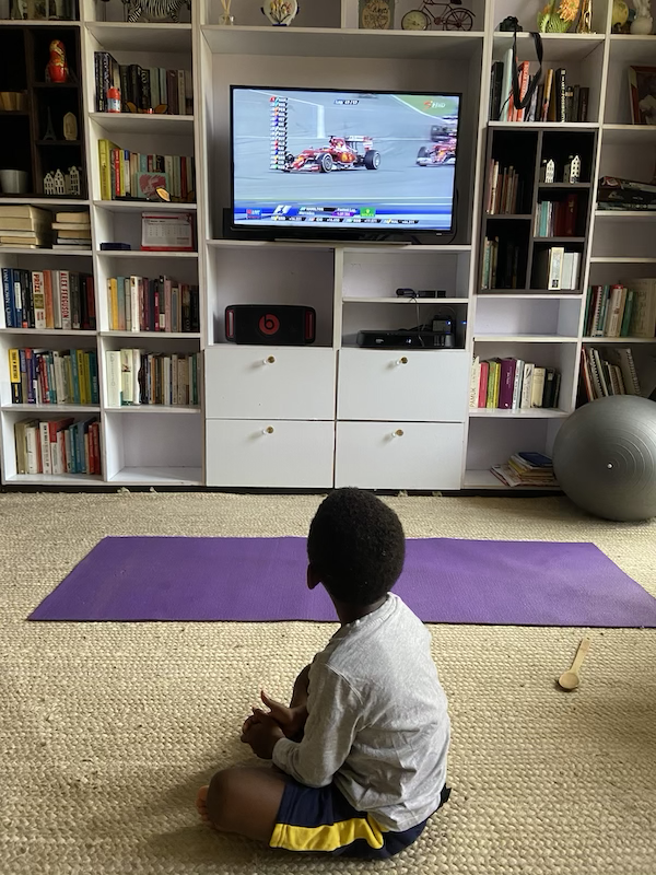 Nigerian boy watching Formula 1